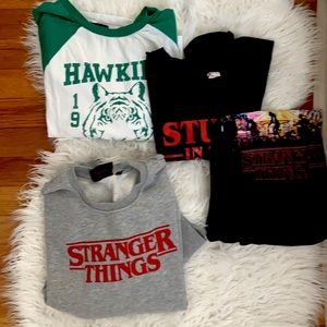 Pack of Stranger Things shirts and sweatshirt